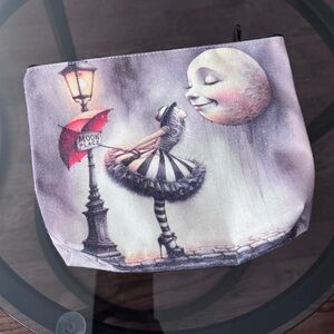 Artistic make up bag with a moon and ballerina